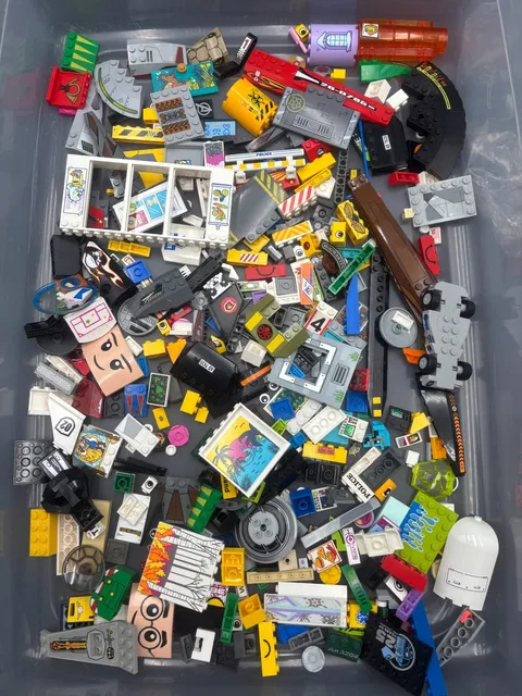1 lb. and 3oz.  Bulk LEGO pieces with stickers and painted on decals (Lot B)