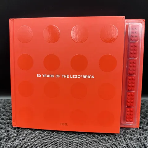 LEGO 50 Years of the LEGO Brick Hardcover Book w/ Commemorative LEGO Bricks 2008