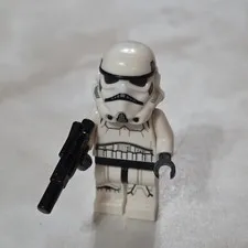 LEGO Star Wars Imperial Stormtrooper minifigure holding a black blaster (SW1137)