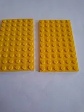 No 412.  2x Lego plate 6x10.  3033 Yellow
