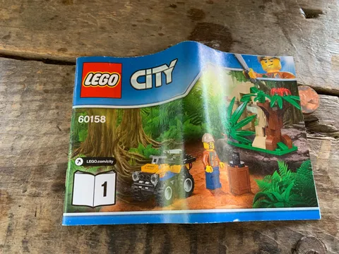 instruction booklet for the LEGO City Jungle Cargo Helicopter (60158) Book 1