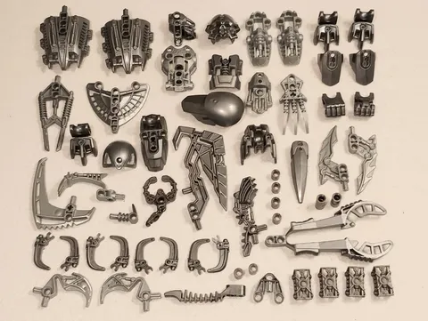 Lego Lot Silver Bionicle Parts Masks Torsos Feet Hands Weapons Claws Technic