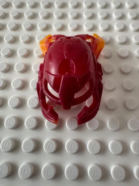 LEGO Bionicle Mask Malum with Marbled Trans-Orange Pattern 64259pb01