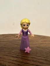 lego rapunzel minifigure with flower accessory.  Great condition!!