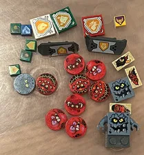Lego Lot of 26 Nexo Knights Round 2x2 Goblin Printed Face Tiles/Nexo Logo Tiles