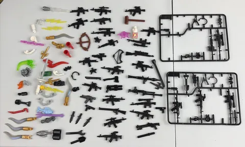 LEGO Lot Over 100 Pieces Variety Weapons includes All pictured Guns Knives