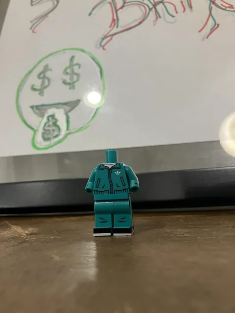 Lego Minifigure - Citizen Brick - Adidas Tracksuit - Turquoise Misprint