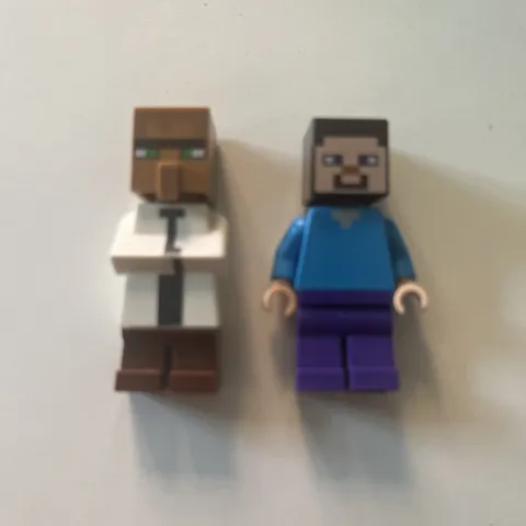 2 Minecraft mini figures - (librarian not Lego)
