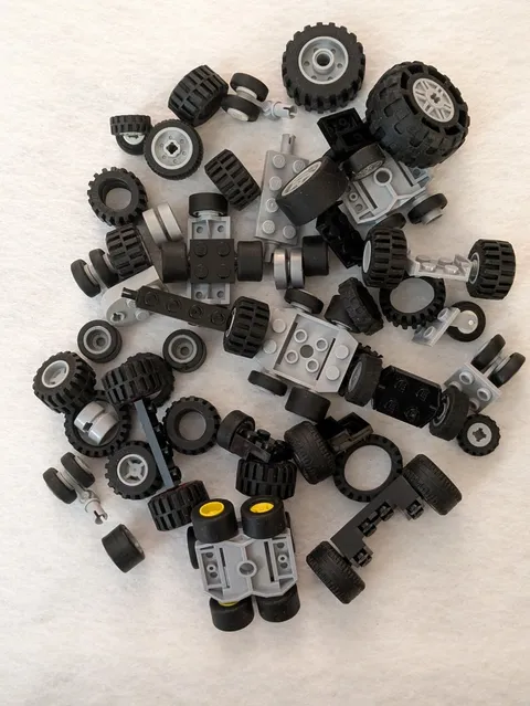 Lot of LEGO Tires Wheels and Axels Parts Pieces Various Sizes About 75 Pcs