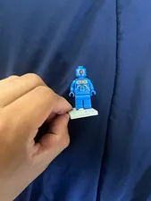 LEGO omac minifigure from Batman . Still has stiff arms .