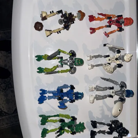 I Have 8 LEGO Bionicle building Figures complete with Weapons and Masks 