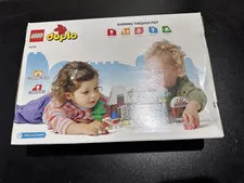 LEGO duplo set 10976, Santa’s Gingerbread House, factory sealed, dented box
