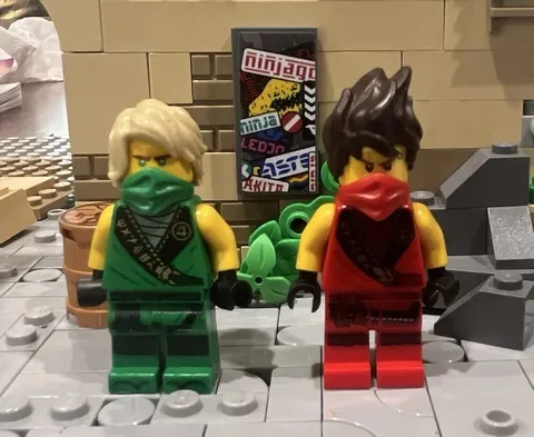 LEGO NINJAGO rebooted minifigures Kai, and Lloyd, Lloyd’s legs are very shaky.