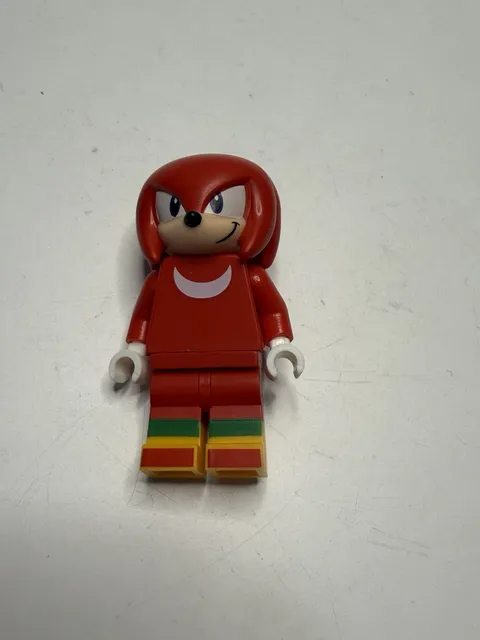 This is the LEGO Knuckles minifigure from the Sonic the Hedgehog series.