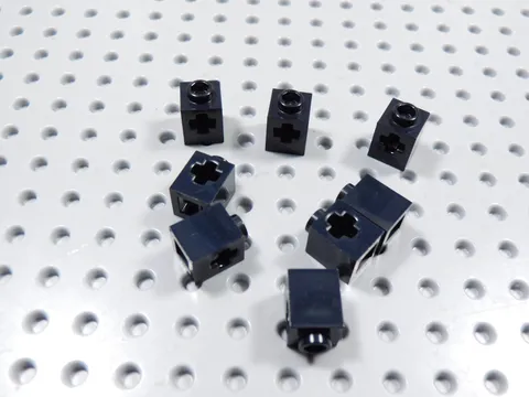 LEGO Lot of 8 Black 1x1 Technic Bricks w/ Axle Hole BH