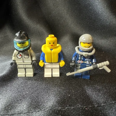 Lot of three (3) Lego guys -- deep sea diver, life vest, other dude w/ helmet