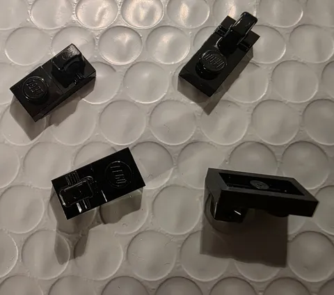 NEW LEGO 4X BLACK PLATE 1X2 W/STUB #53922.