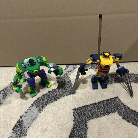 lot of two lego marvel mechs. Hulk and Wolverine with figures 