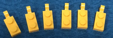 LEGO PART 63868 PLATE 1X2 WITH HORIZONTAL GRIP CLIP ON END 6 PIECES (YELLOW)