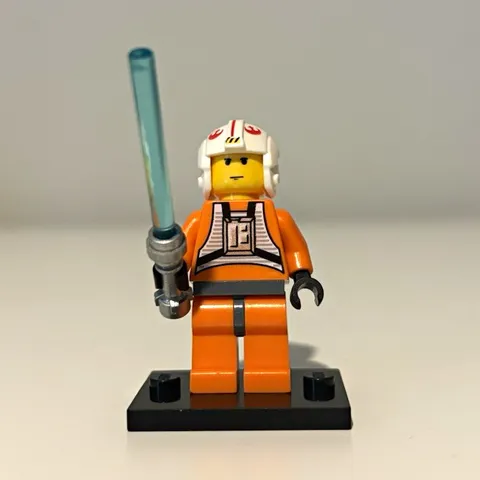 LEGO Star Wars 20 Years Rebel Pilot Minifigure Blue Lightsaber Display Base