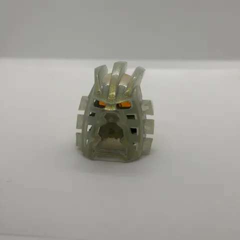 LEGO BIONICLE Kanohi Avohkii Mask Of Light Trans-Clear With Gold Glitter