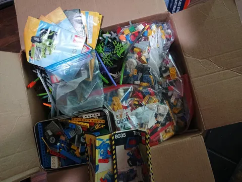 25lbs of Bulk misc Legos and K-nex. includes a couple instruction booklets 
