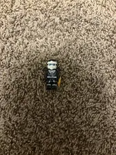 LEGO Minifigure Black Outfit White Mask/Helmet with Blue Eyes