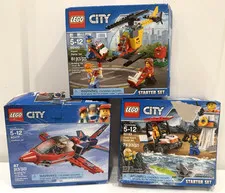 Lego City retired set lot 60100, 60163 & 60177 sealed bags in opened damaged box