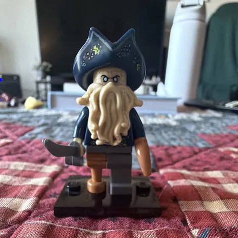 LEGO Davy Jones Minifigure mint condition with sword from The Black Pearl