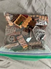3 - 1/2 pound bags of brown lego pieces - used pieces - random pieces