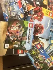 A bunch of Lego instructions some new some old most come from retired sets