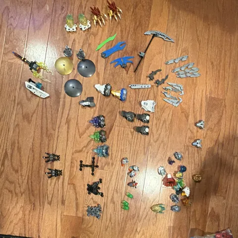 LEGO Bionicle Bulk Lot Masks, Weapons, Armor, Connectors & Parts Multicolor