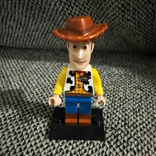 LEGO Toy Story Woody Minifigure with Brown Cowboy Hat on Black Display Base