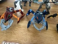 9 Lego Bionicles- Visoraks, Rahkshis & Rorzakhs Plus 4 Canisters & 2 Manuals