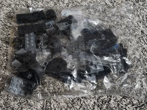LEGO Unopened Sealed Bag Black Grey Tire Blocks Unsure Of Set Possibly Vehicle 