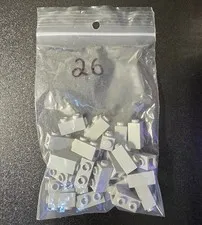 1x1x1 2-3rd with studs on side light blueish gray Part No. 32952