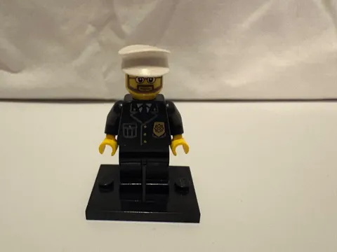 Lego Police Minifigure  Black Uniform And White Hat.
