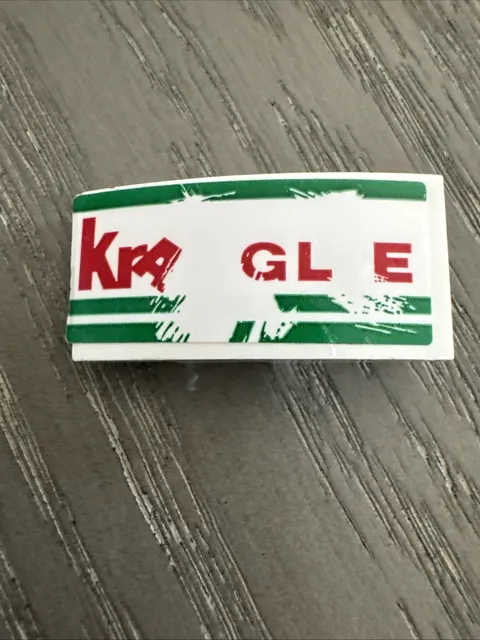 LEGO Slope 2 x 4 Curved with Kragle Sticker (93606) 1 Piece