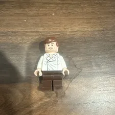 LEGO Minifigure Brown Hair, White Shirt, Brown Legs