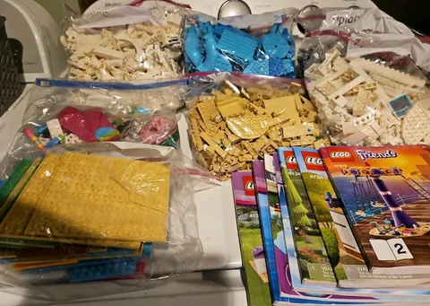 LEGO Legos  7 Bags Of Lego Pieces Mix. 6 Lego Manuals