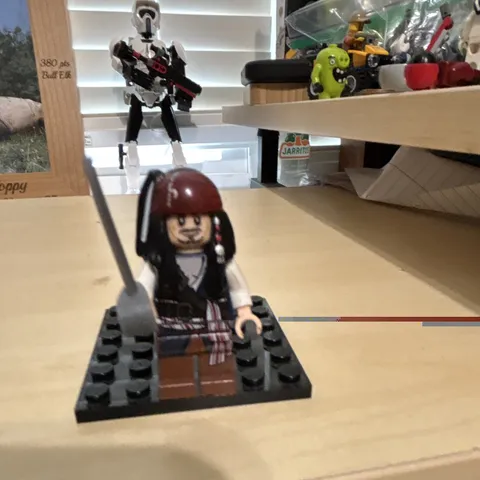 LEGO Pirates of the Caribbean Jack Sparrow Minifigure w/ Sword Accessory