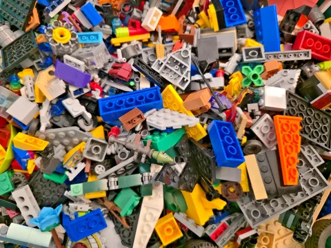 Random Spare LEGO Pieces + Other Random Small Toys (selling per 8 oz.)