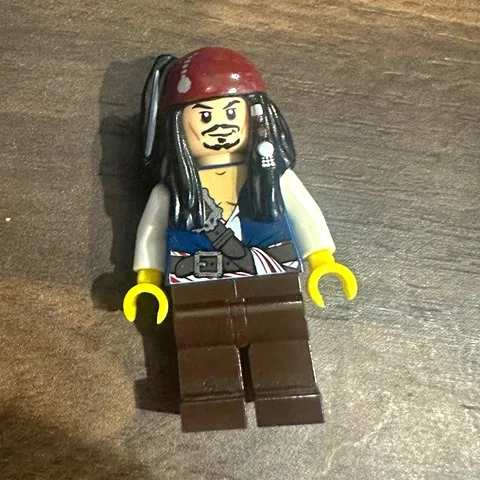 LEGO Pirates of the Caribbean Minifigure Red Bandana, Black Hair, Brown Legs