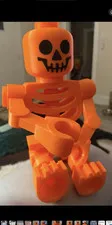 3D Printed LEGO Orange Skeleton Figure - PLA- 3d printed Halloween