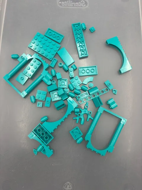 2 oz. Mixed Turquoise Legos - standard blocks and unique pieces