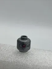 LEGO - Minifig, Head w/ Mechanical Right Eye Red, Silver Face Mask Pattern