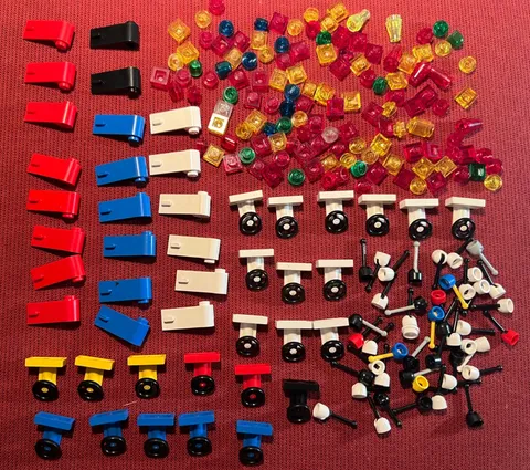 Lego lot of 220 small car parts: steering wheels, gear shifts, doors, lights
