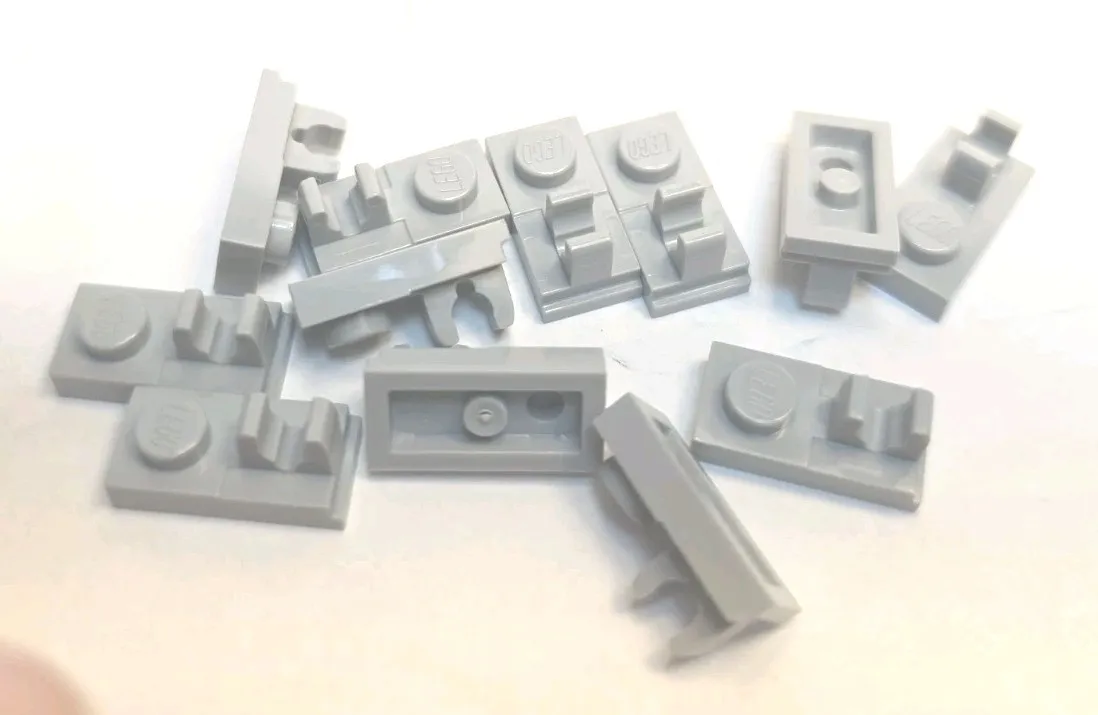 12x lego plate modified 1x2 with  upright clip,Medium stone gray.We Combine Ship