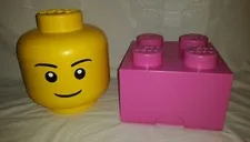Lot of 2 Lego storage containers, pink square brick and yellow boy Lego head