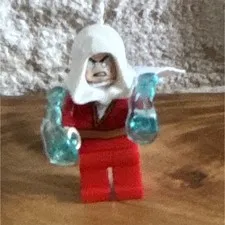 LEGO Minifigures Minifigure Red Outfit w/ White Hood Cape & Trans-Light Blue